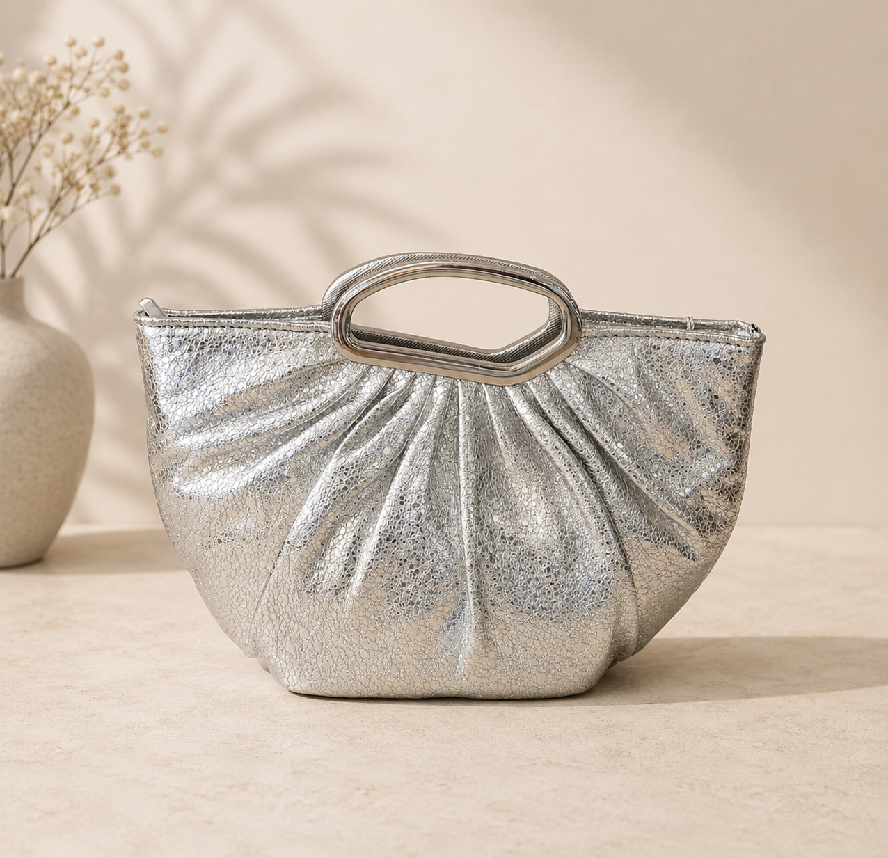Metallic Gathered Clutch with Sculptural Handle