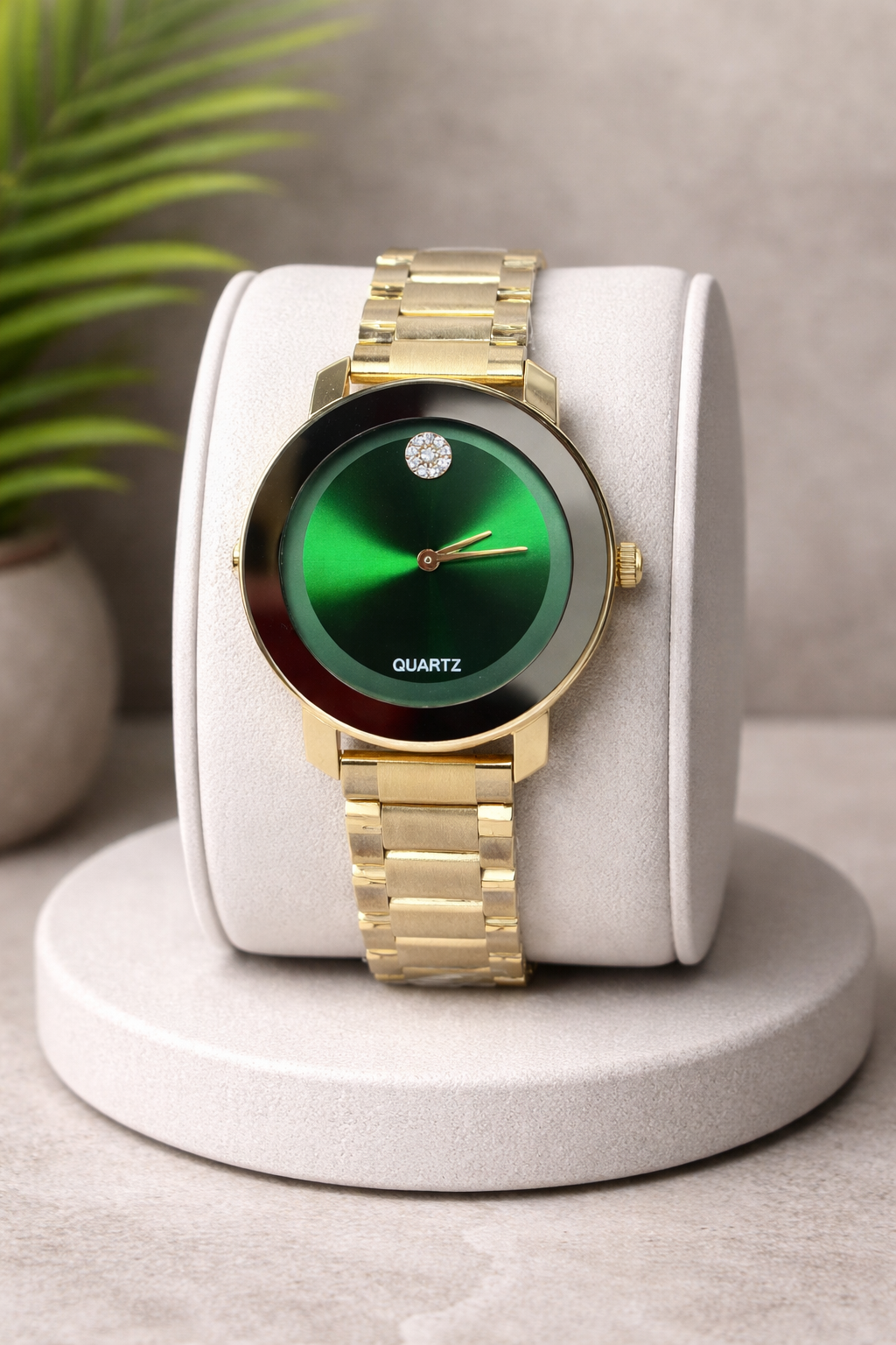 Gold Tone Watch with Emerald Dial