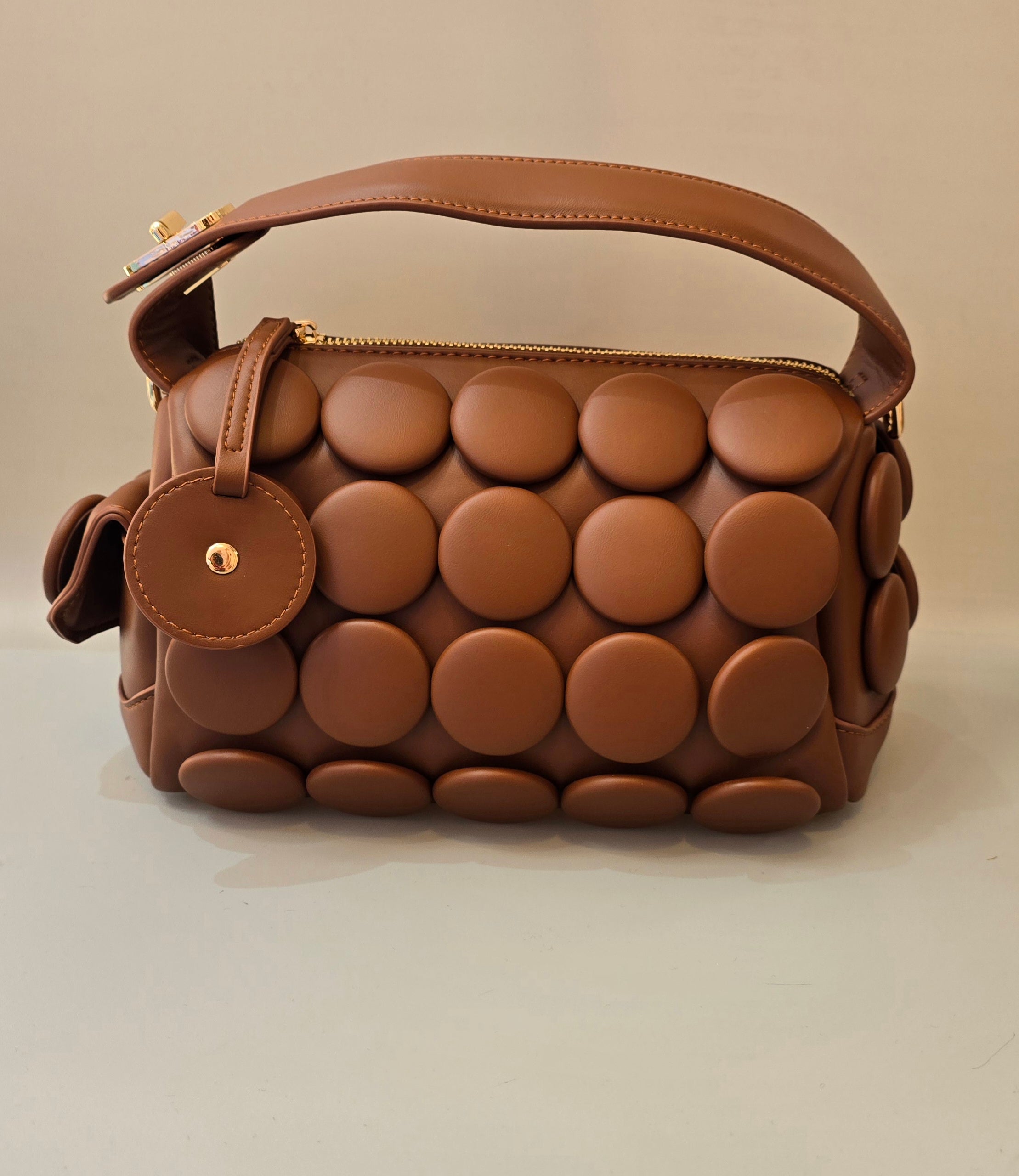 Statement Bags in Modern Luxe Finishes