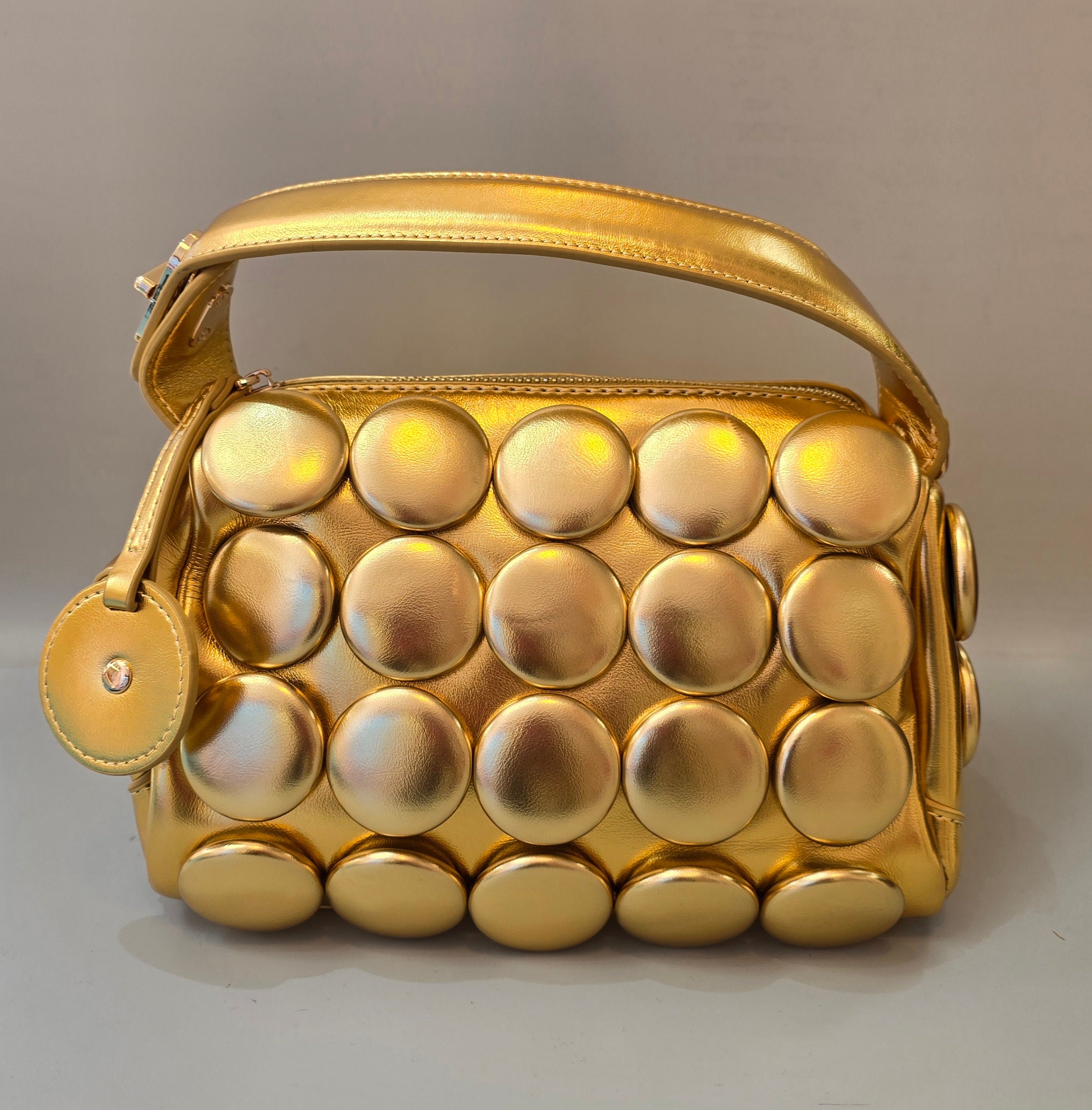 Statement Bags in Modern Luxe Finishes